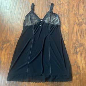 Vintage 90s y2k cosmopolitan black mini dress with cute details.